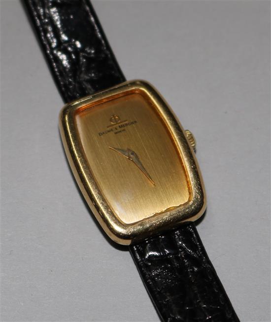 A ladys 18ct gold Baume & Mercier manual wind wrist watch.
